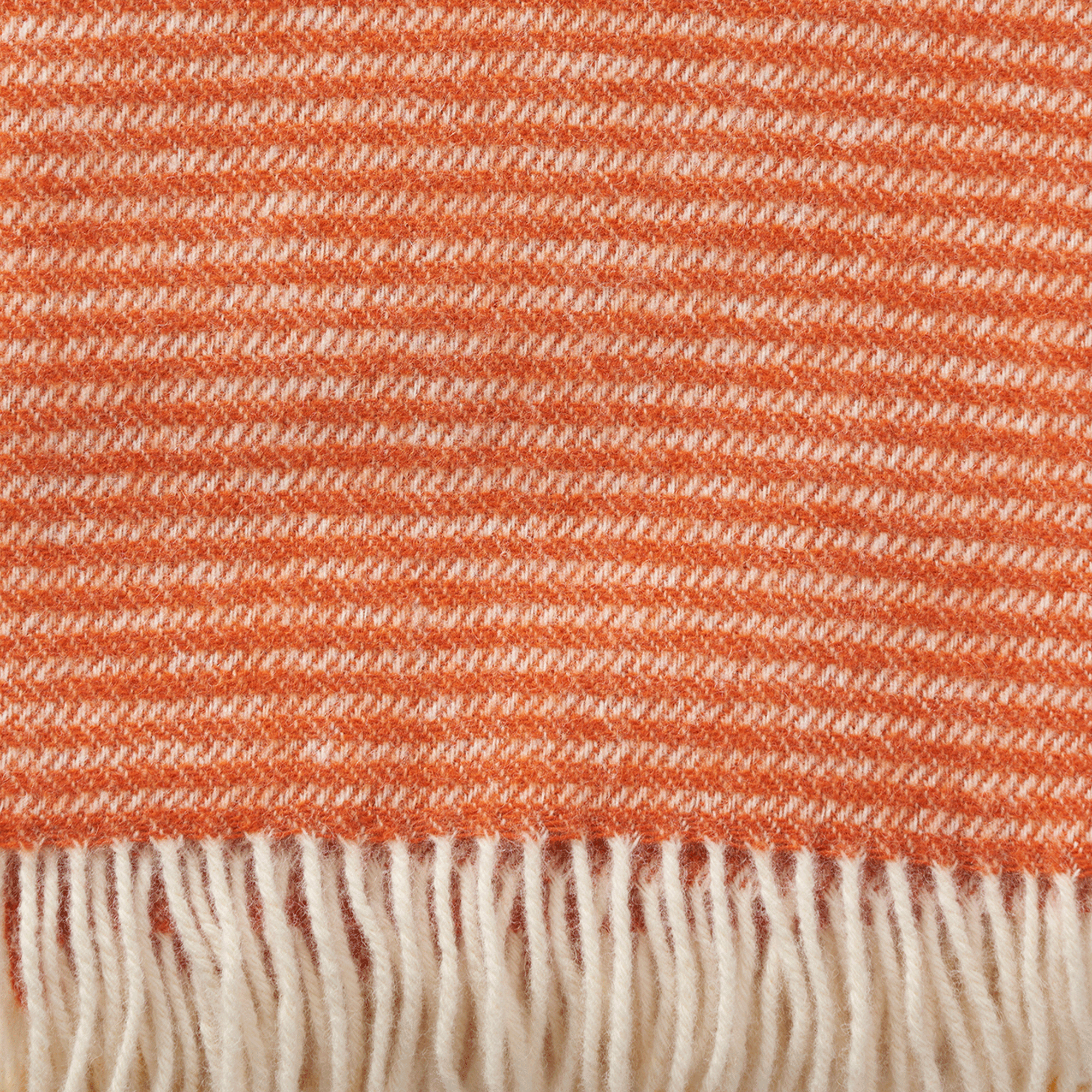 Close up of Klippan Ralph orange throw showing weave and texture
