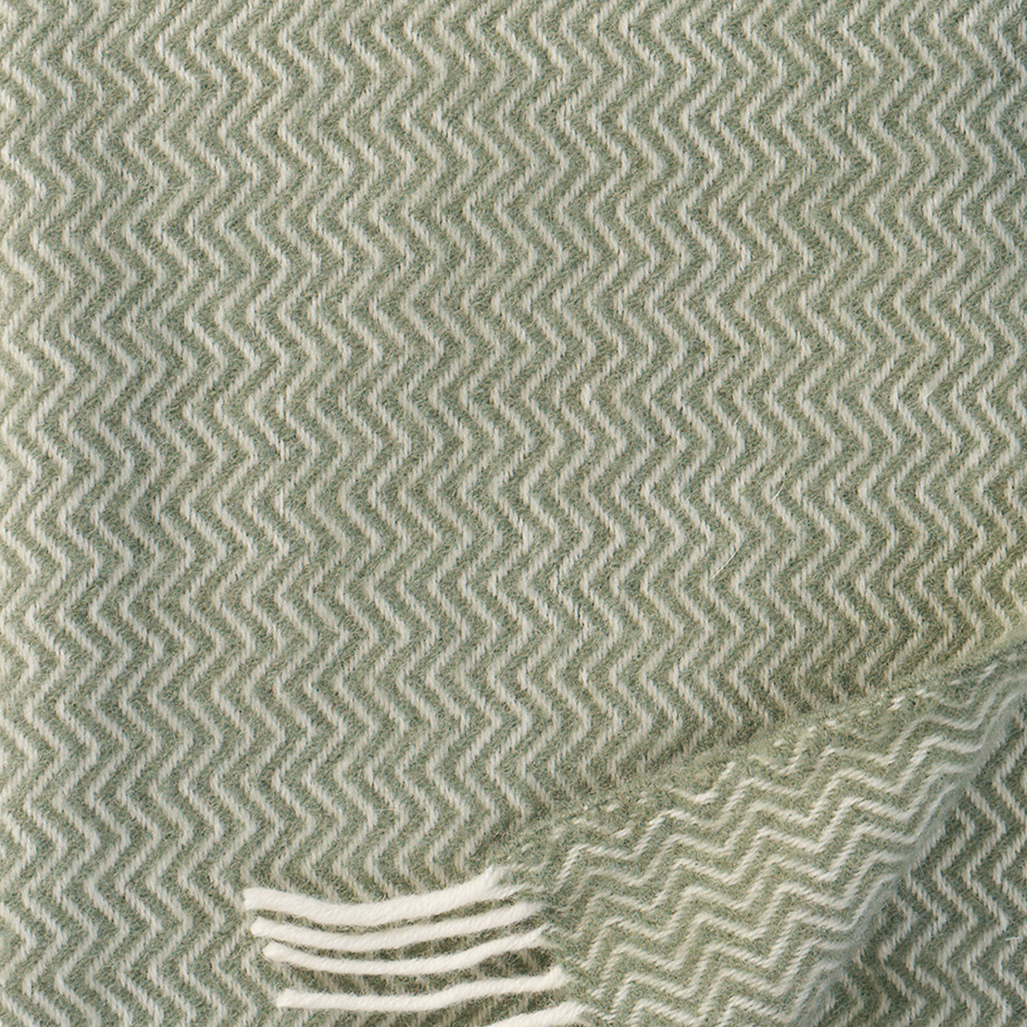 Close up of Soret in colour Pistachio green showing texture and weave