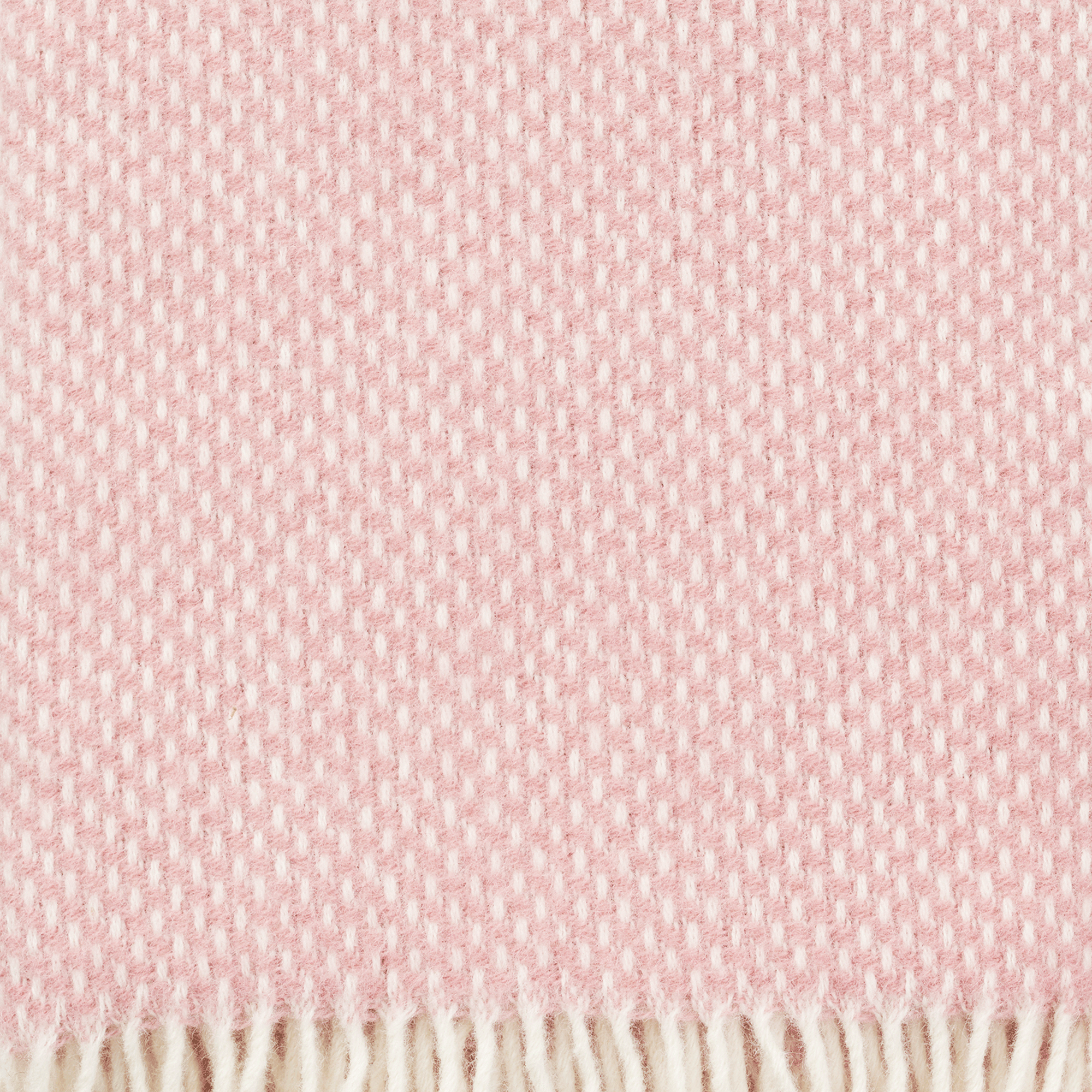 Close up of the weave of Preppy rose pink lambswool throw from Klippan