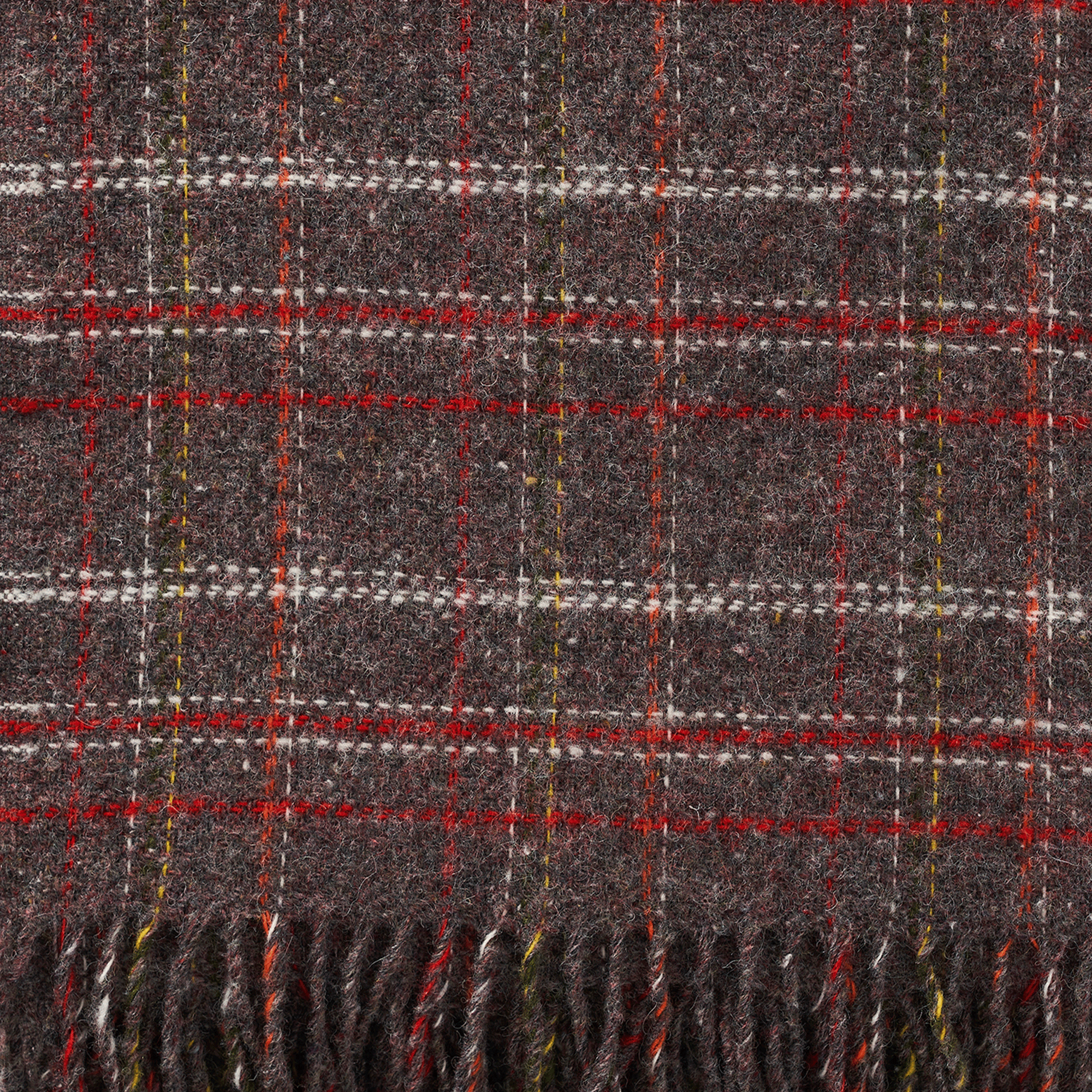 A close up viw of Square red Brown throw from Klippan showing the texture and weave