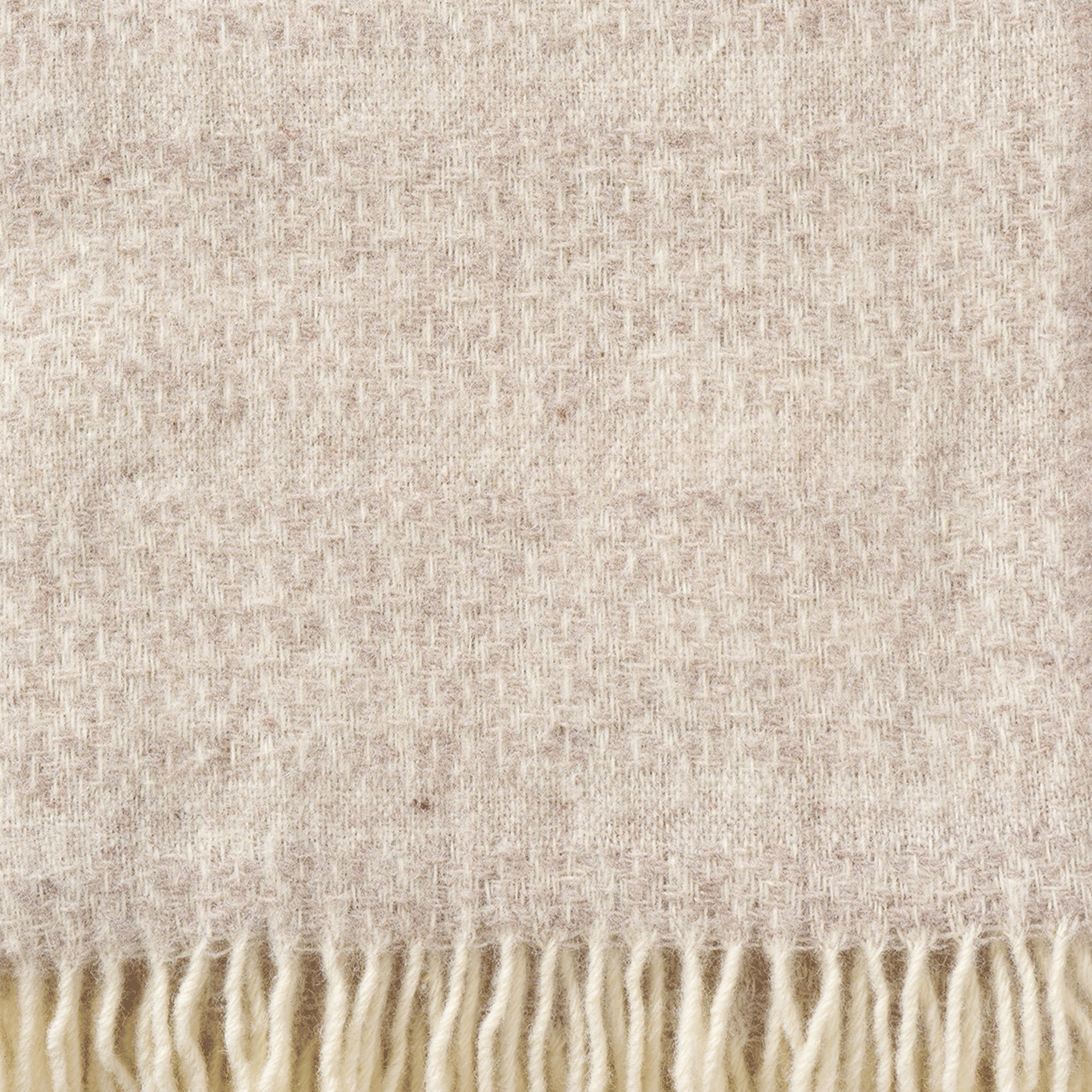 Close up of Klippan Lambswool throw Porto Beige showing texture and weave