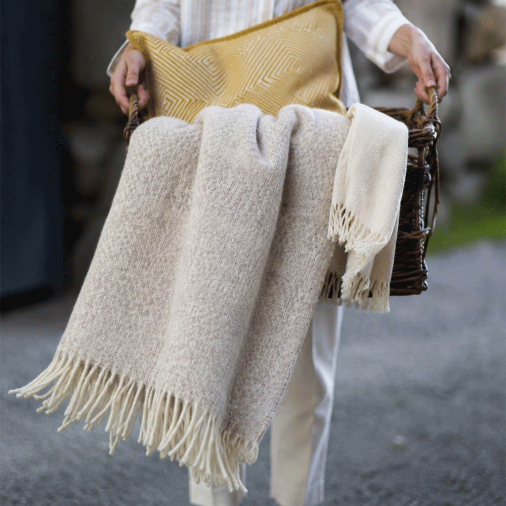 Klippan Beige throw with lovely weave in a basket