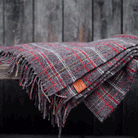 Klippan's Square throw on a bench outside
