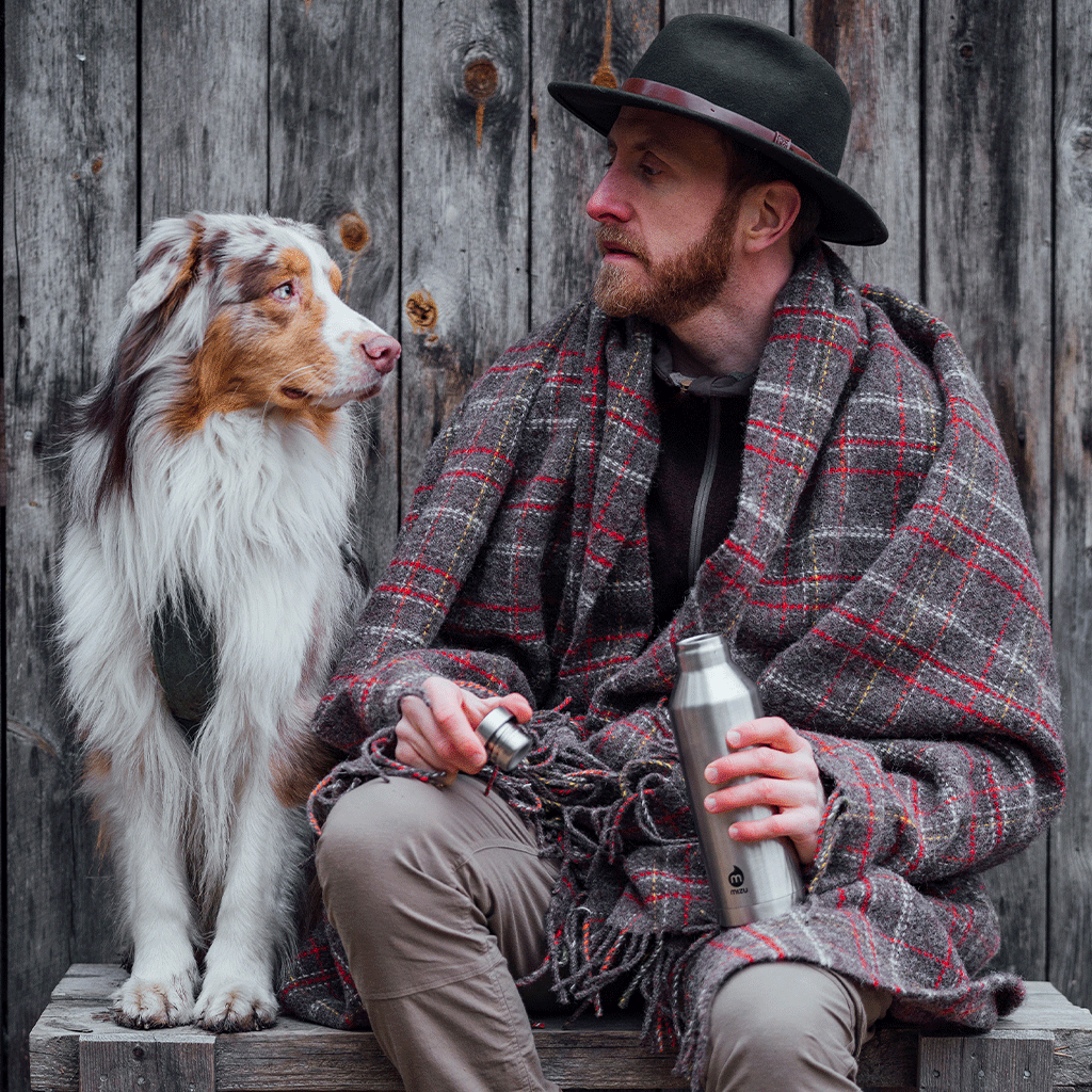Klippan Square throw with man and his dog outside