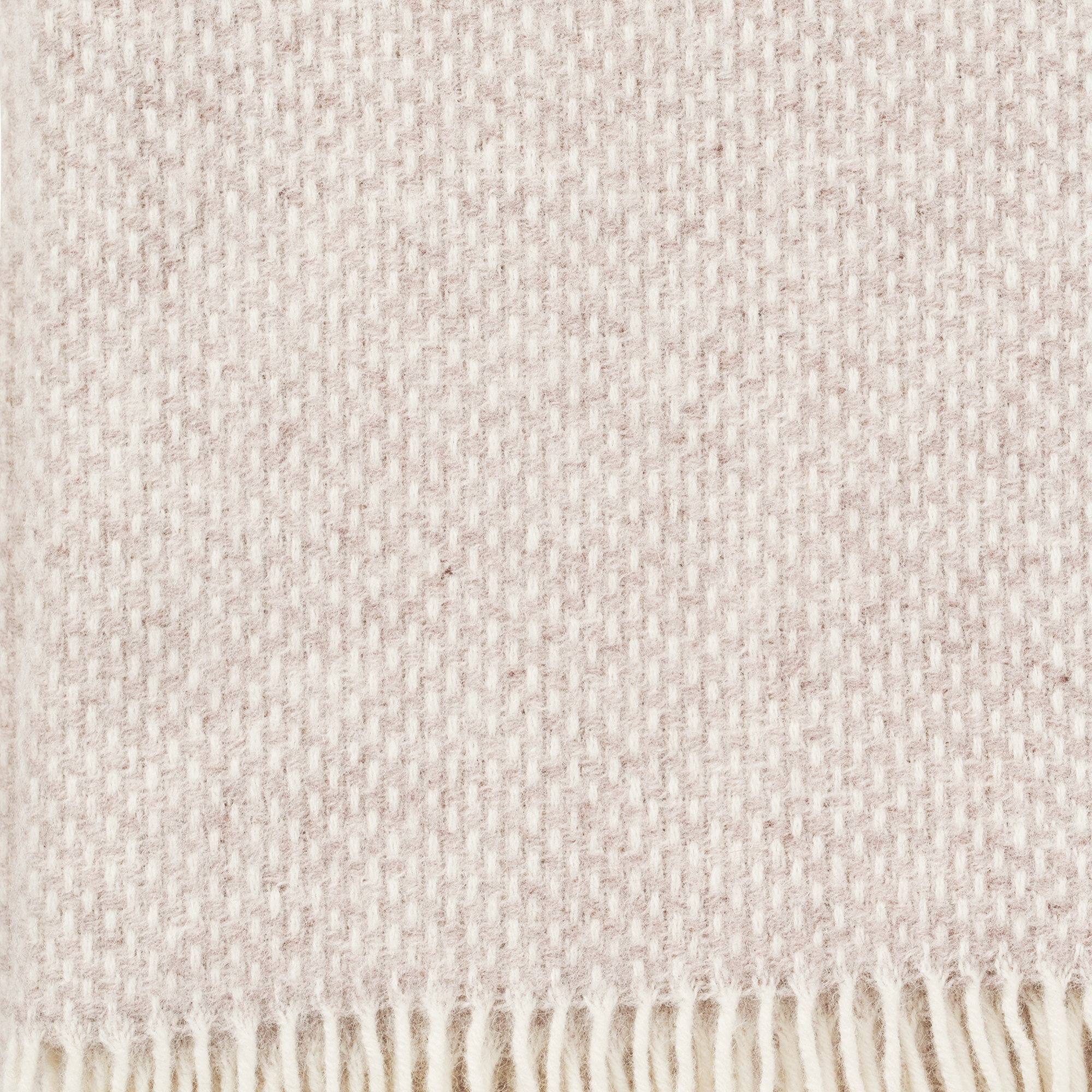 Close up of Klippan's Preppy Beige throw showing the vertical weave
