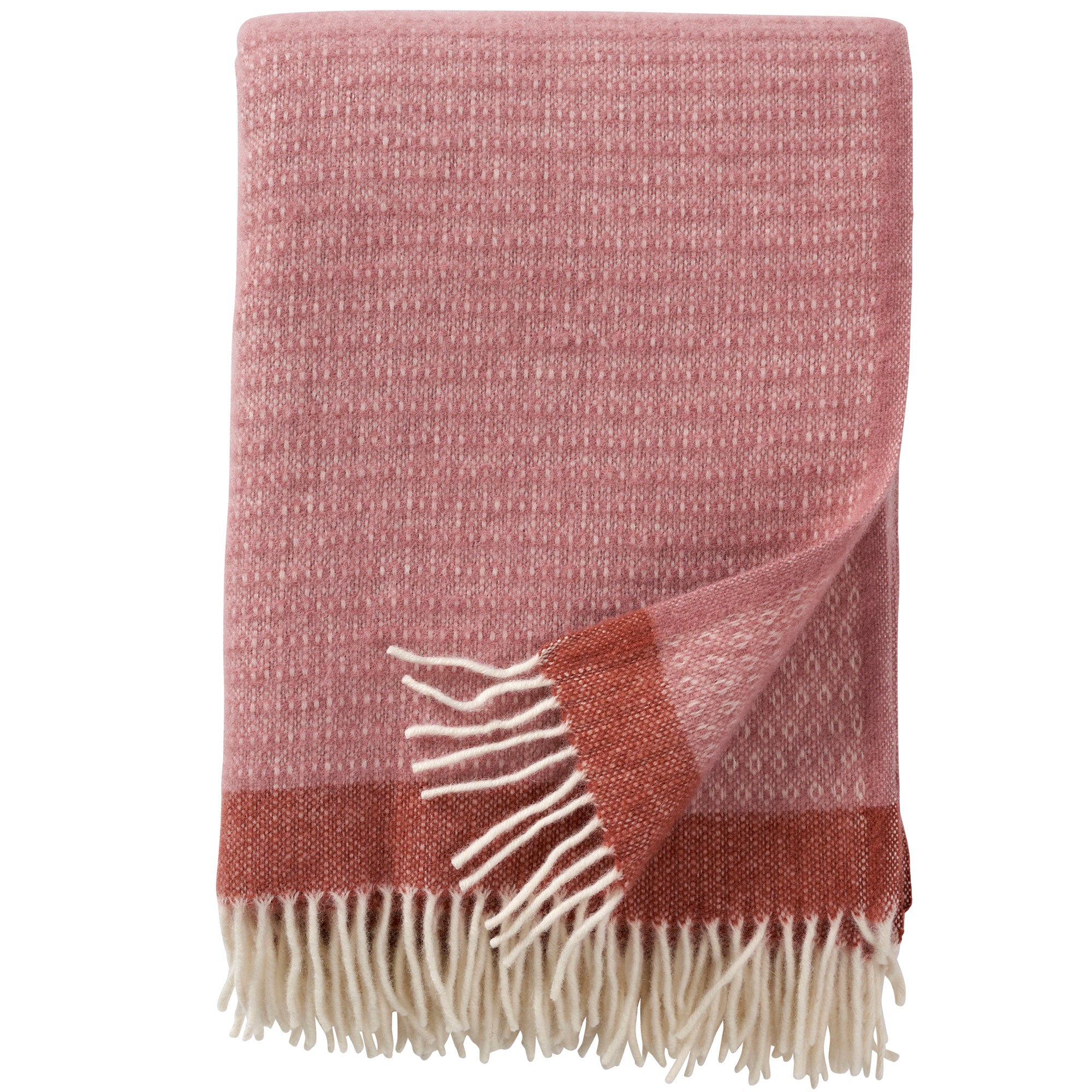 A dusty rose colored eco lambswool throw with fringes, displayed on a white background.